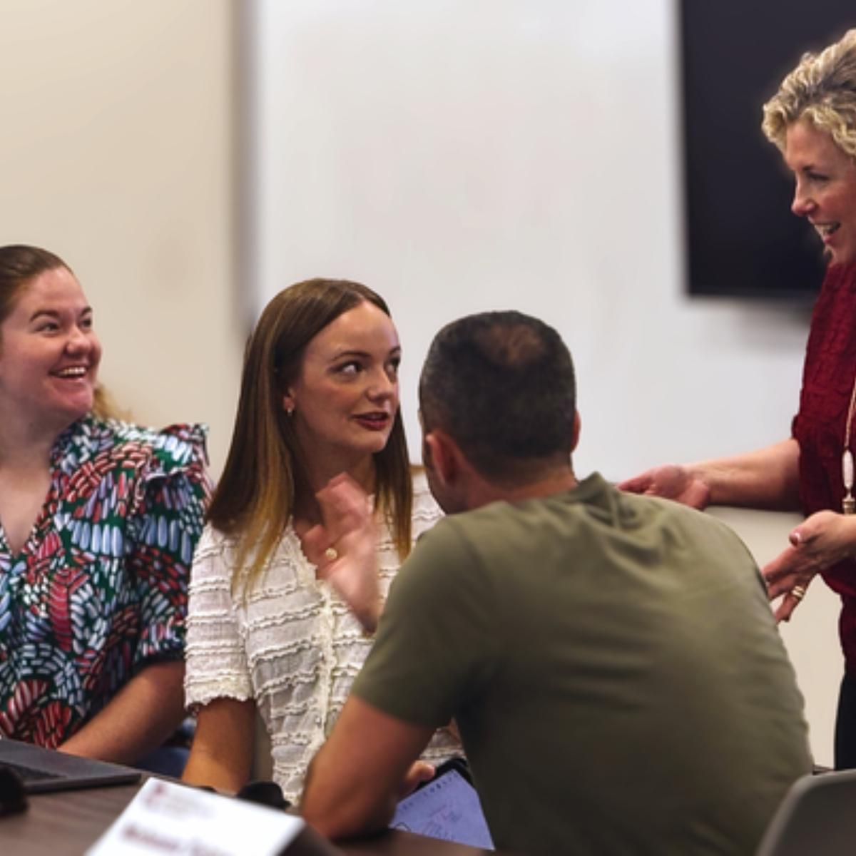 Shannon Harmon interacting with PFF participants during a session. 